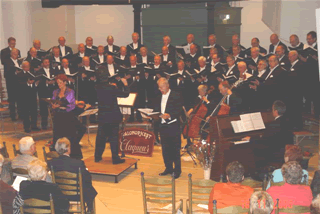 Claqueur bij het jubileumconcert van het Coevorder Mannenkoor